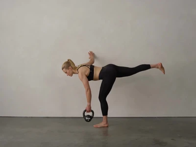 The 9 Kettlebell Exercises For Swimmers To Add Into Their Workouts Thumbnail Image