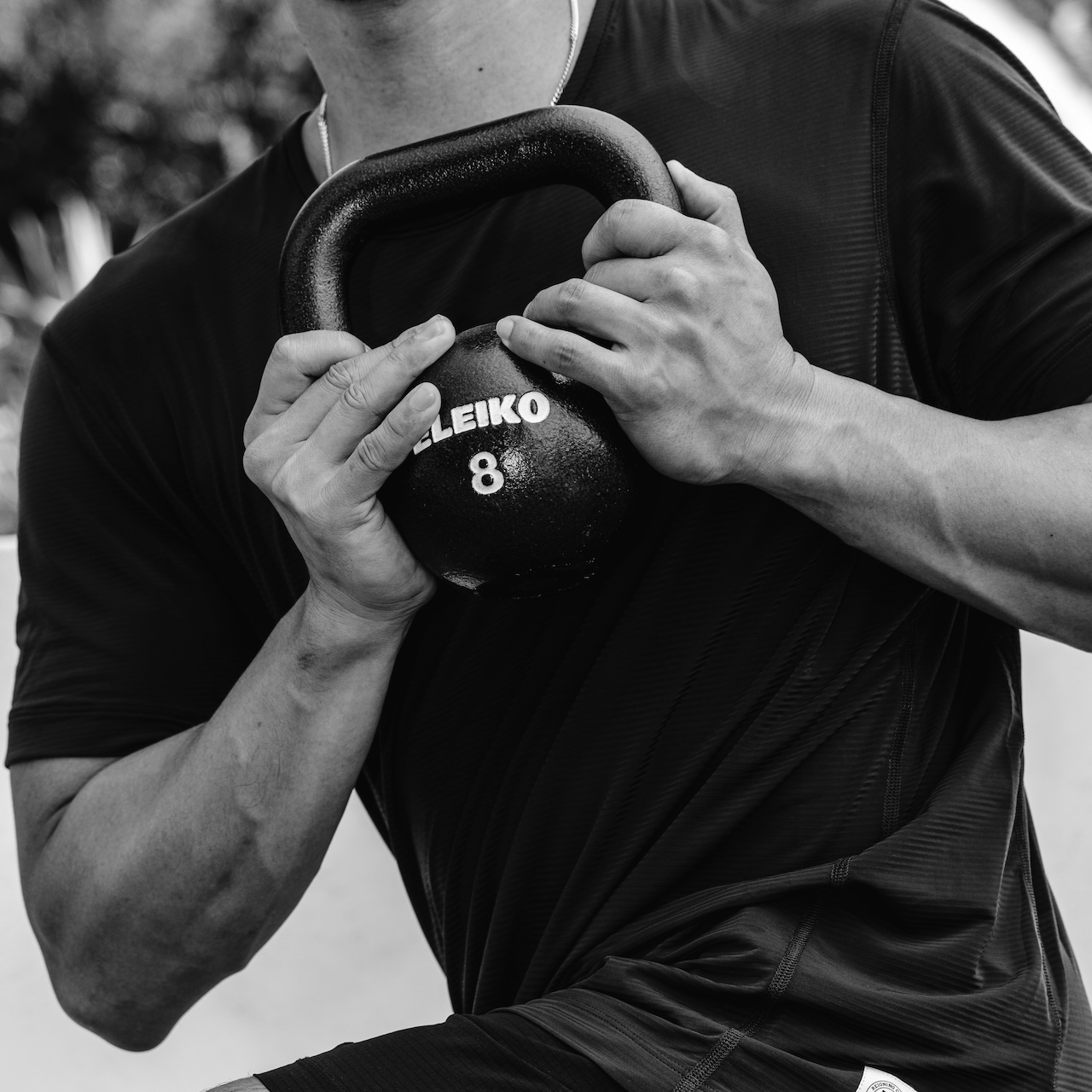 A man training with a kettlebell